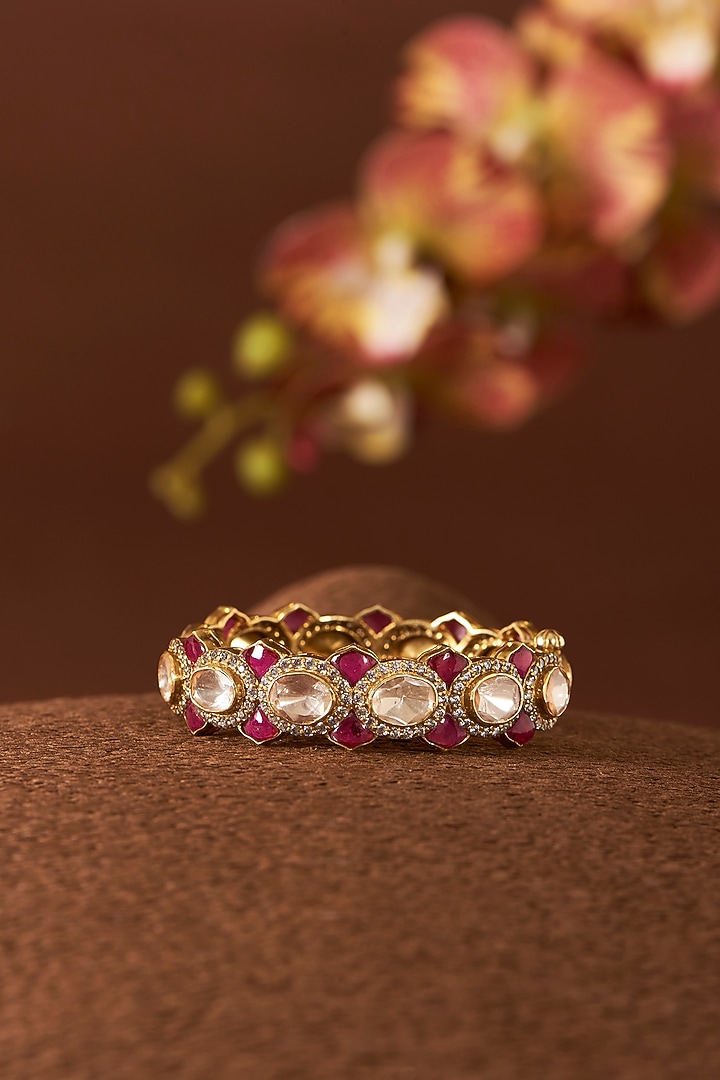 Yellow Gold Finish Moissanite Polki & Ruby Bangle In Sterling Silver by STELLA CREATIONS at Pernia's Pop Up Shop
