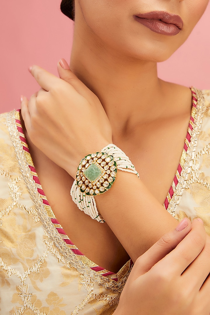 Yellow Gold Finish Moissanite Polki & Emerald Bracelet In Sterling Silver by STELLA CREATIONS at Pernia's Pop Up Shop