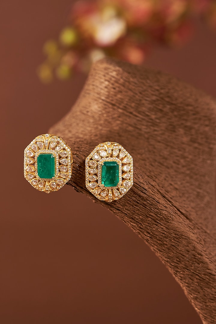 Yellow Gold Finish Moissanite Polki & Emerald Stud Earrings In Sterling Silver by STELLA CREATIONS at Pernia's Pop Up Shop