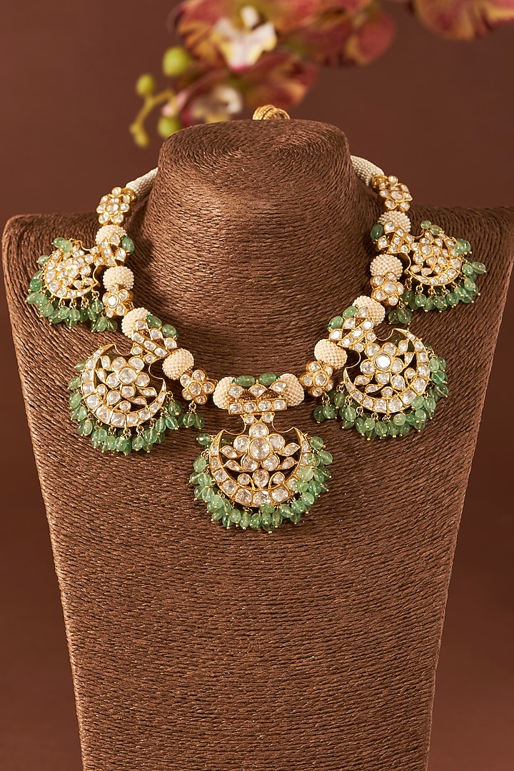 Yellow Gold Finish Moissanite Polki & Emerald Necklace Set In Sterling Silver by STELLA CREATIONS at Pernia's Pop Up Shop