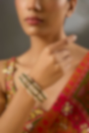 Yellow Gold Finish Moissanite Polki & Emerald Stone Bracelet In Sterling Silver by STELLA CREATIONS at Pernia's Pop Up Shop