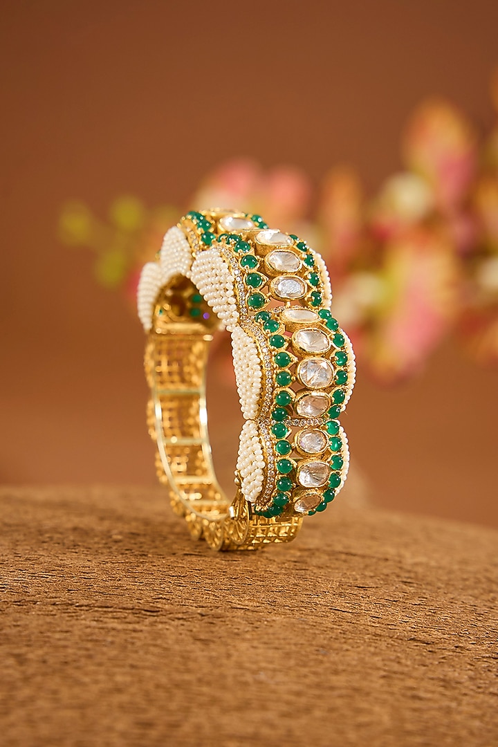 Yellow Gold Finish Moissanite Polki & Emerald Stone Bracelet In Sterling Silver by STELLA CREATIONS at Pernia's Pop Up Shop