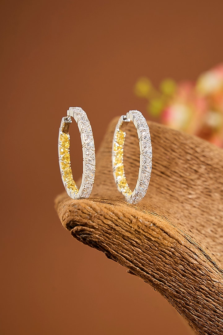 White Gold Finish Eurostar Zircon & Sapphire Stone Hoop Earrings In Sterling Silver by STELLA CREATIONS at Pernia's Pop Up Shop