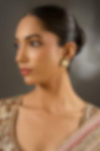 Yellow Gold Finish Moissanite Polki & Emerald Stone Stud Earrings In Sterling Silver by STELLA CREATIONS at Pernia's Pop Up Shop