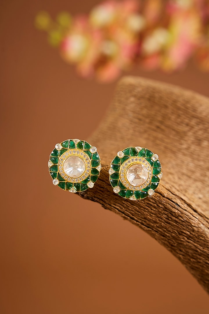 Yellow Gold Finish Moissanite Polki & Emerald Stone Stud Earrings In Sterling Silver by STELLA CREATIONS at Pernia's Pop Up Shop