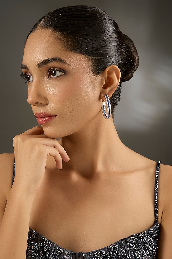 White Gold Finish Zircon & Sapphire Stone Hoop Earrings In Sterling Silver by STELLA CREATIONS at Pernia's Pop Up Shop