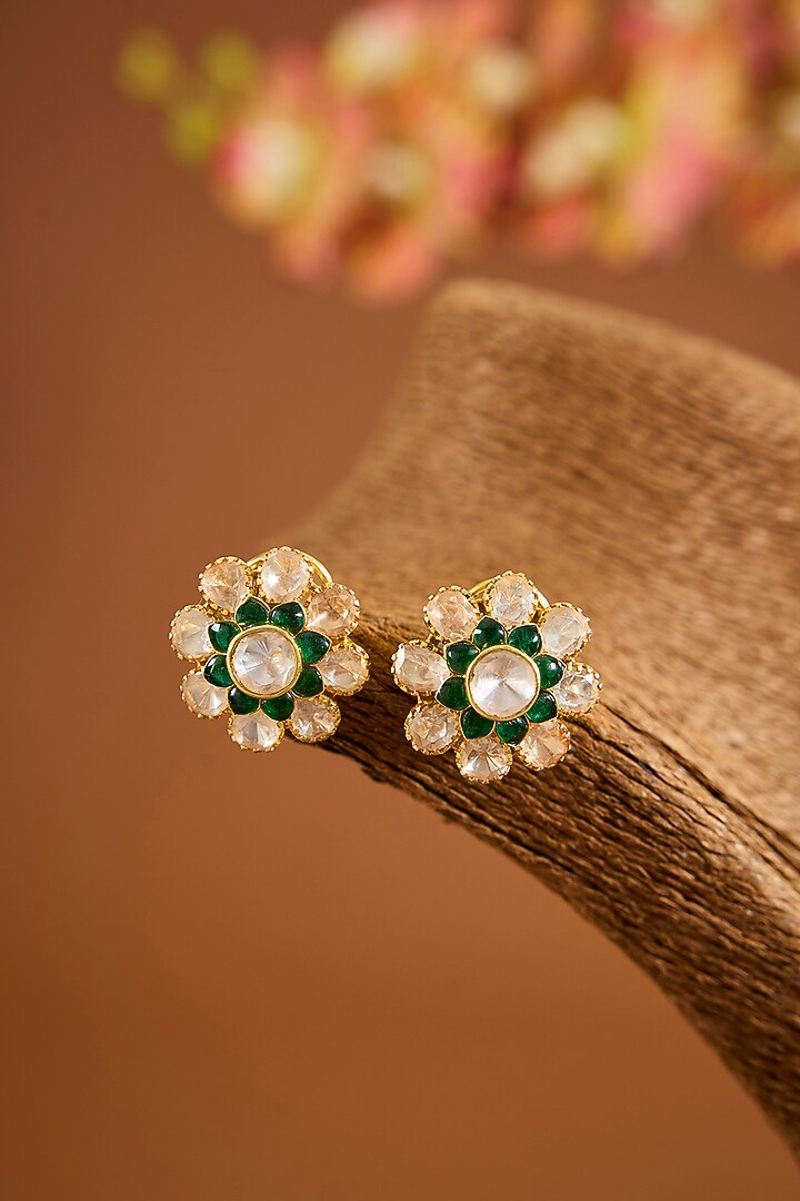 Yellow Gold Finish Moissanite Polki & Emerald Stone Stud Earrings In Sterling Silver by STELLA CREATIONS at Pernia's Pop Up Shop