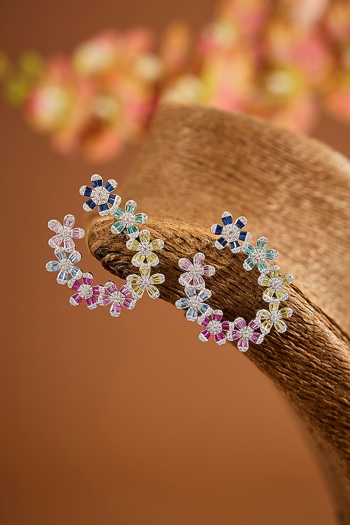 White Gold Finish Zircon & Sapphire Stone Hoop Earrings In Sterling Silver by STELLA CREATIONS at Pernia's Pop Up Shop
