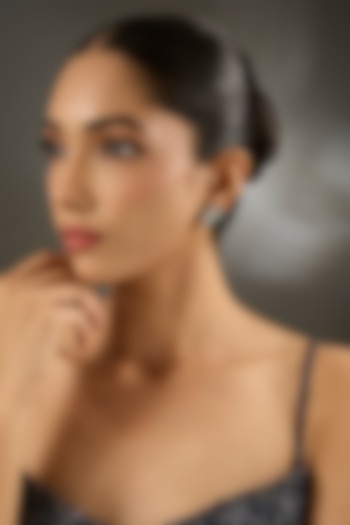 White Finish Zircon & Emerald Stone Stud Earrings In Sterling Silver by STELLA CREATIONS at Pernia's Pop Up Shop