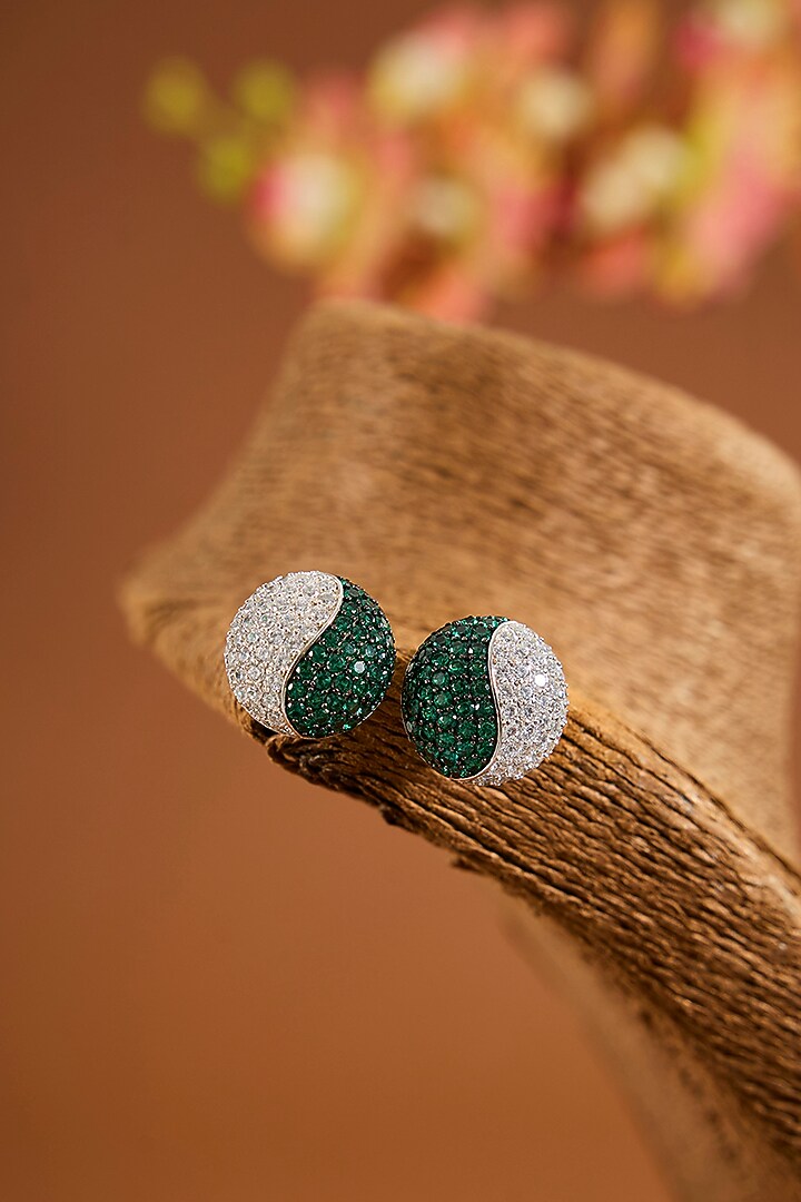 White Finish Zircon & Emerald Stone Stud Earrings In Sterling Silver by STELLA CREATIONS at Pernia's Pop Up Shop