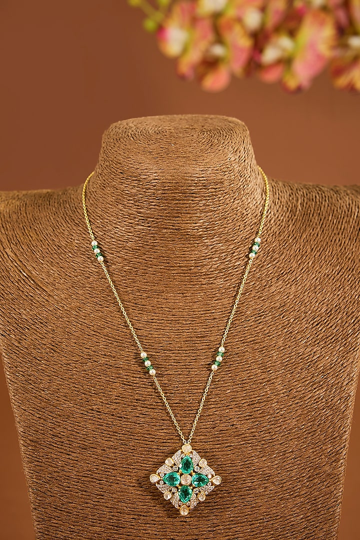 Yellow Gold Finish Emerald Stone Pendant Necklace Set by STELLA CREATIONS at Pernia's Pop Up Shop