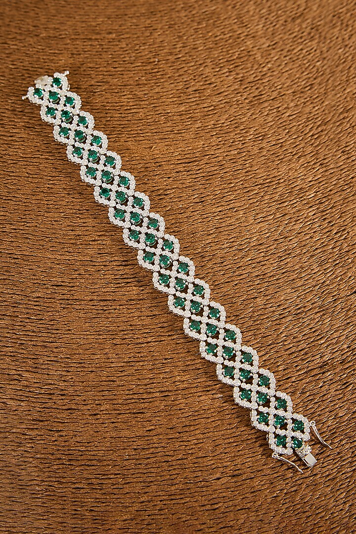 White Gold Finish Zircon & Emerald Stone Openable Bracelet In Sterling Silver by STELLA CREATIONS at Pernia's Pop Up Shop