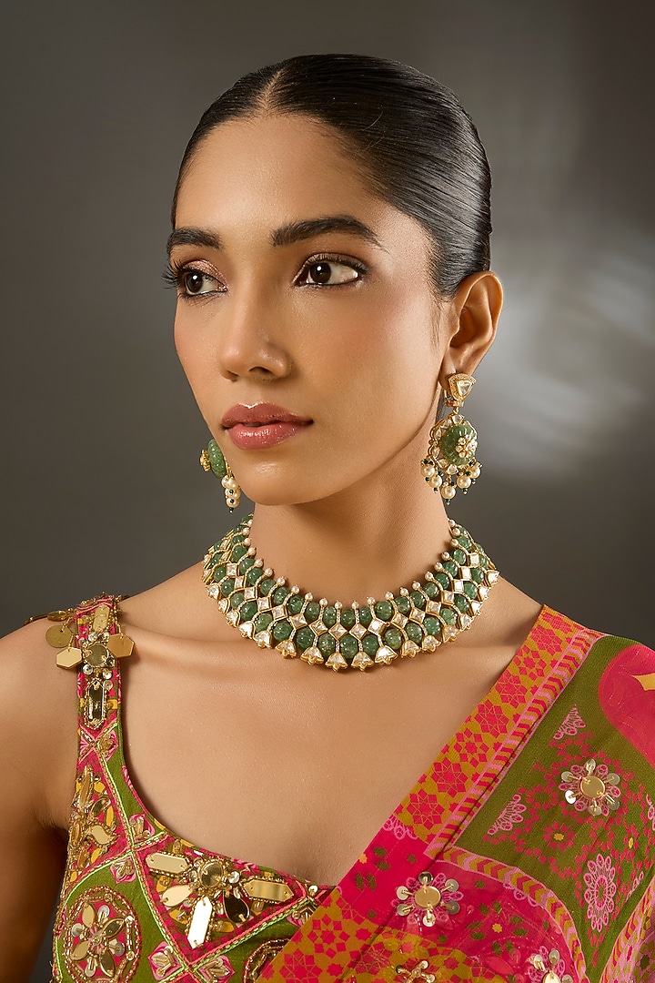 Yellow Gold Finish Emerald Stone Necklace Set In Sterling Silver by STELLA CREATIONS at Pernia's Pop Up Shop