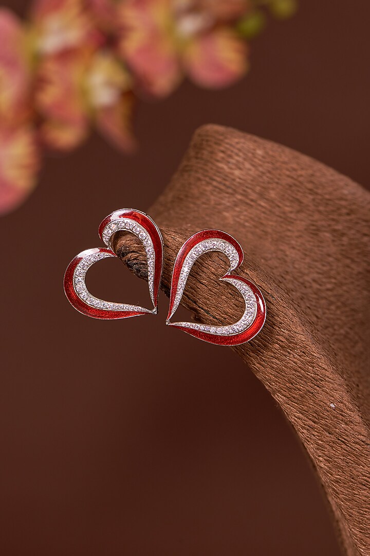 White Finish Zircon & Red Enameled Stud Earrings In Sterling Silver by STELLA CREATIONS at Pernia's Pop Up Shop