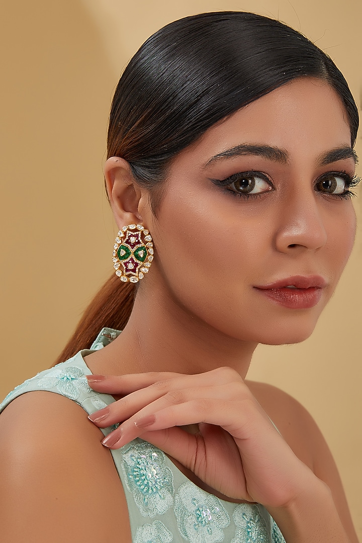 Gold Finish Ruby & Emerald Dangler Earrings In Sterling Silver by STELLA CREATIONS at Pernia's Pop Up Shop