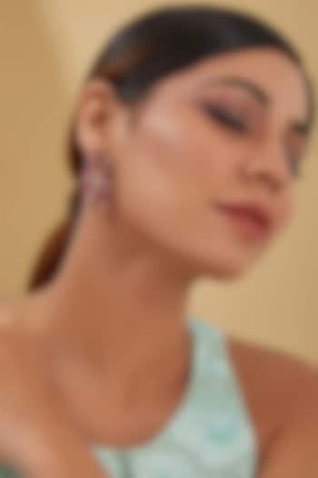 White Finish Zircon & Ruby Dangler Earrings In Sterling Silver by STELLA CREATIONS at Pernia's Pop Up Shop