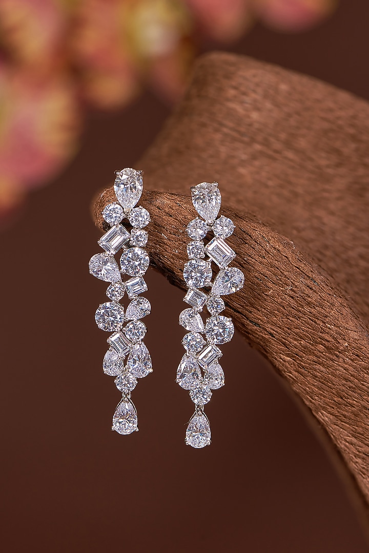 White Finish Zircon Dangler Earrings In Sterling Silver by STELLA CREATIONS at Pernia's Pop Up Shop