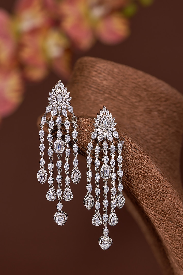 White Finish Zircon Dangler Earrings In Sterling Silver by STELLA CREATIONS at Pernia's Pop Up Shop