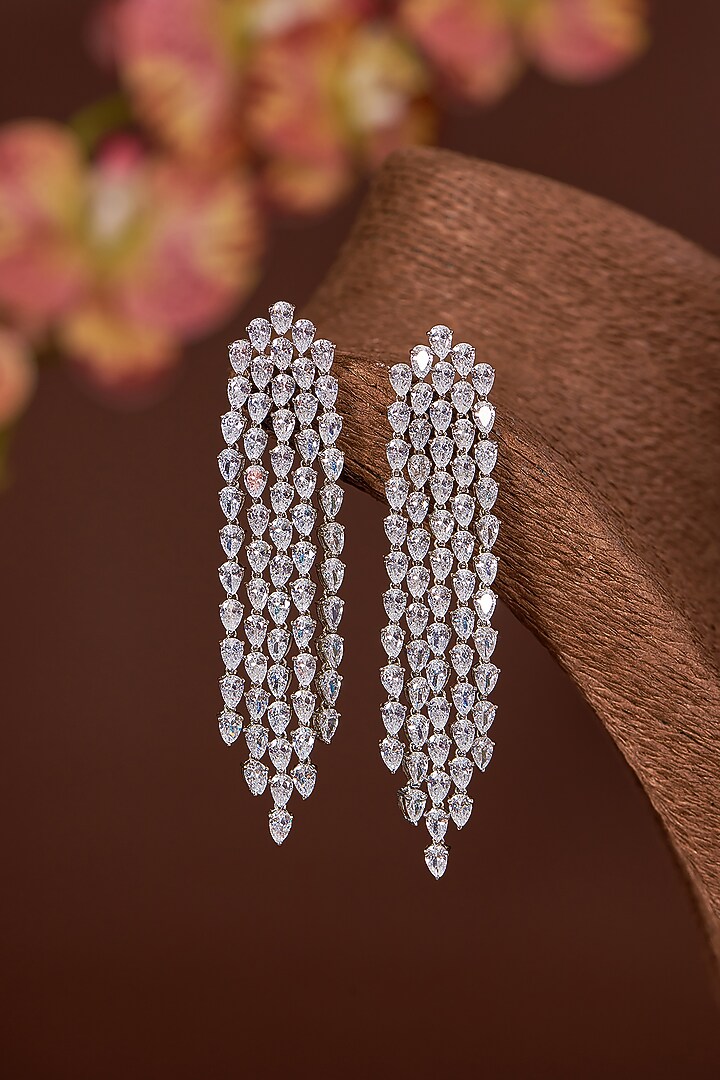 White Finish Zircon Dangler Earrings In Sterling Silver by STELLA CREATIONS at Pernia's Pop Up Shop
