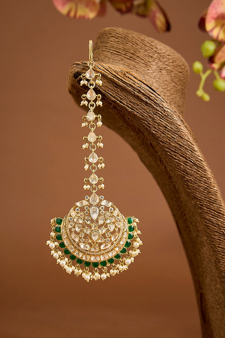 Yellow Gold Finish Moissanite Polki & Emerald Stone Maangtikka In Sterling Silver by STELLA CREATIONS at Pernia's Pop Up Shop