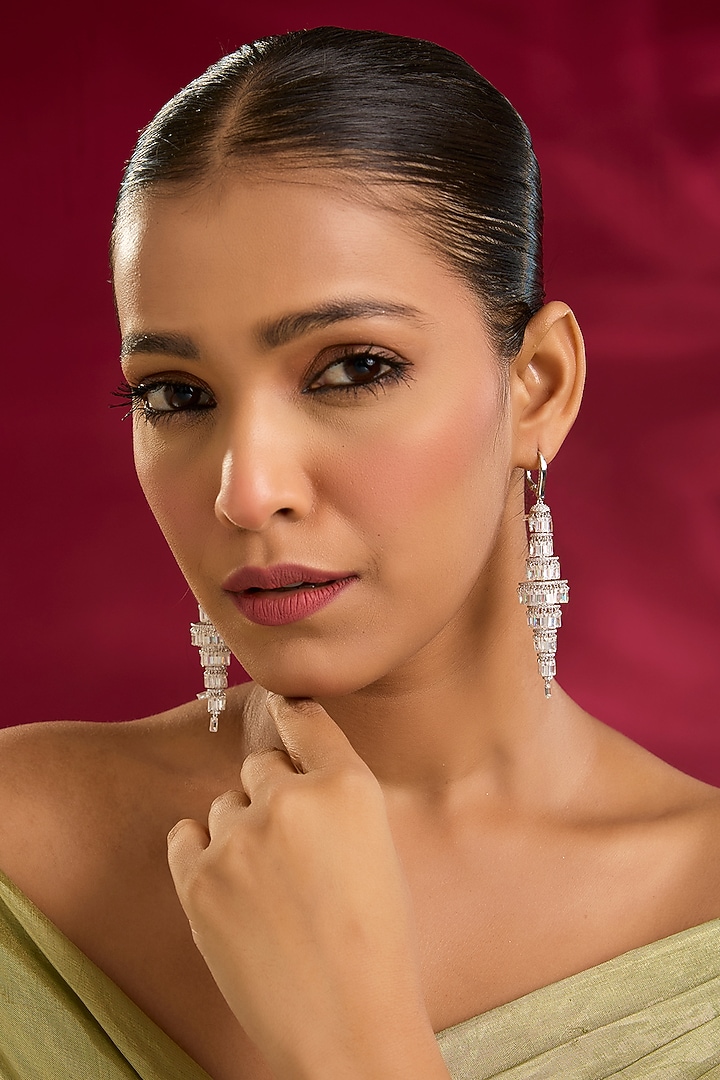 White Gold Finish Swarovski Zircon Dangler Earrings In Sterling Silver by STELLA CREATIONS at Pernia's Pop Up Shop