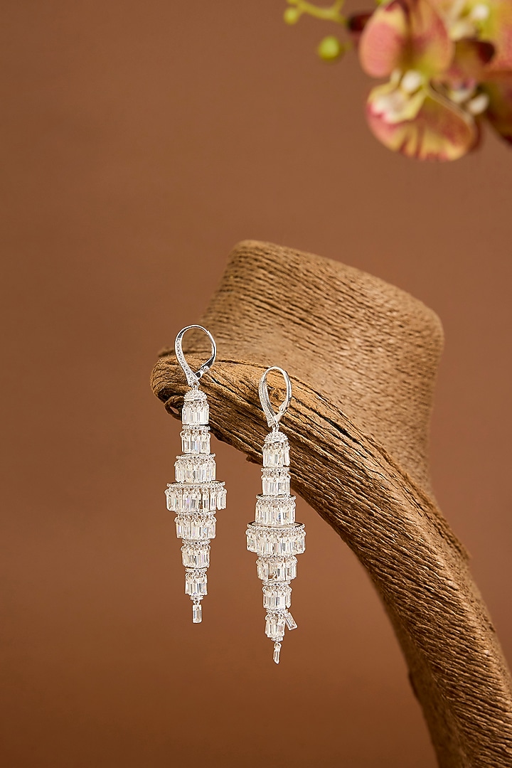 White Gold Finish Swarovski Zircon Dangler Earrings In Sterling Silver by STELLA CREATIONS at Pernia's Pop Up Shop