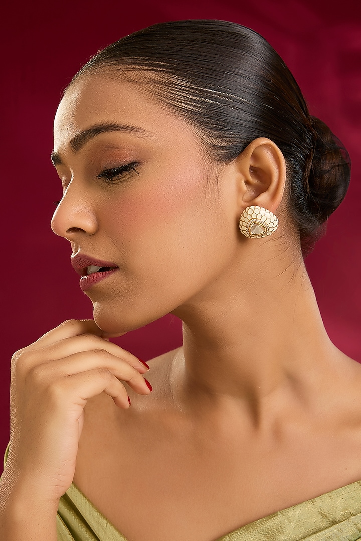 Yellow Gold Finish Moissanite Polki & Swarovski Zircon Stud Earrings In Sterling Silver by STELLA CREATIONS at Pernia's Pop Up Shop
