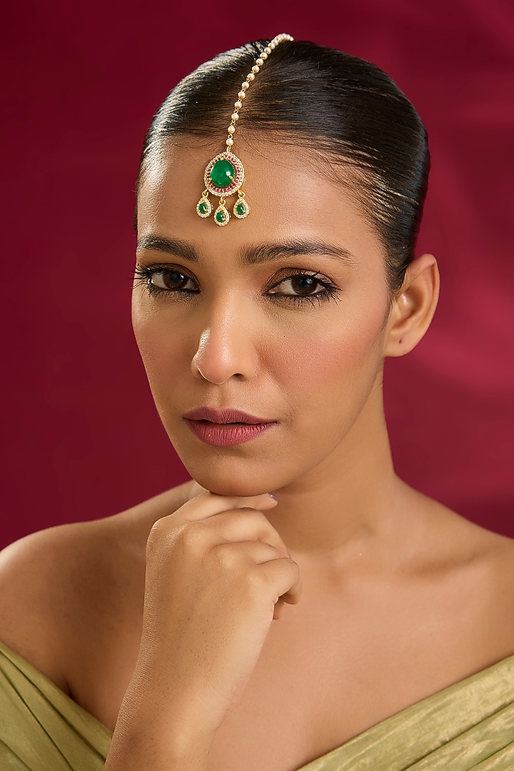 Yellow Gold Finish Ruby & Emerald Stone Maangtikka In Sterling Silver by STELLA CREATIONS at Pernia's Pop Up Shop