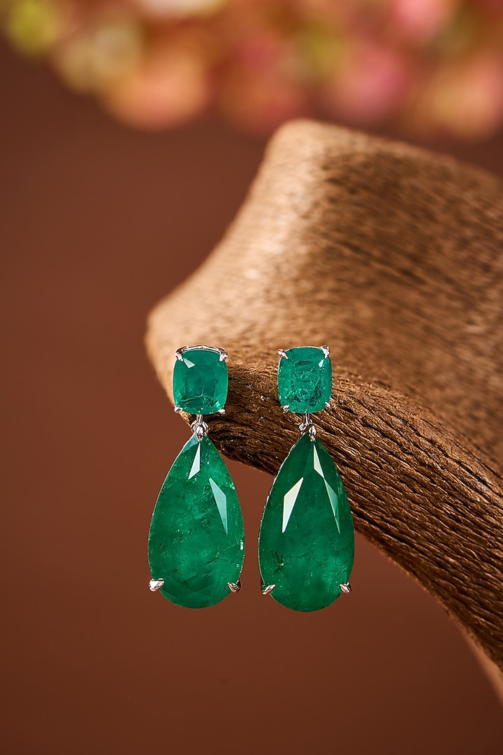 White Gold Finish Eurostar Zircon & Emerald Stone Dangler Earrings In Sterling Silver by STELLA CREATIONS at Pernia's Pop Up Shop