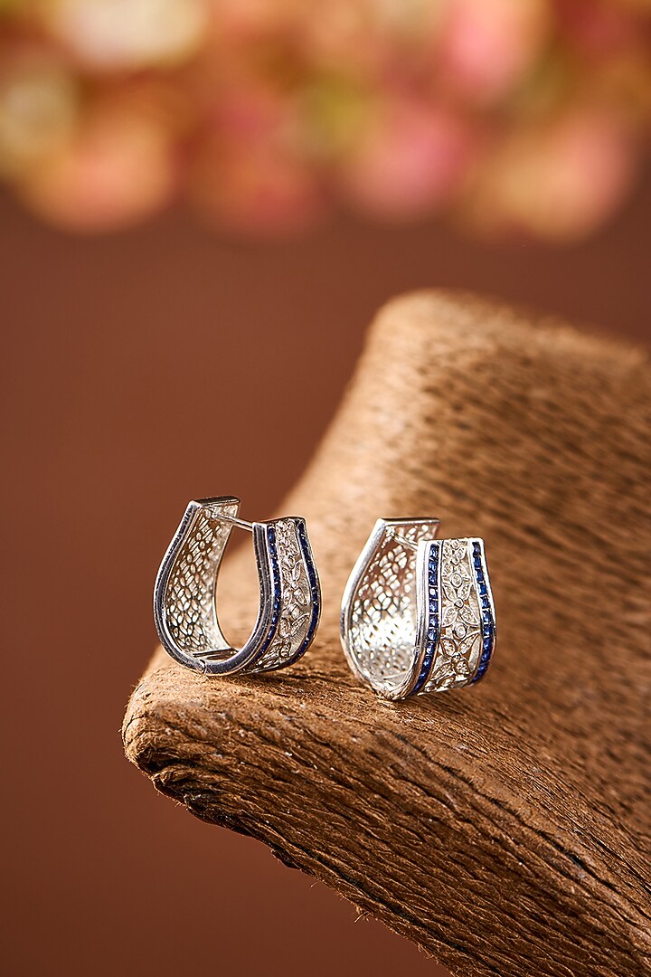 White Gold Finish Eurostar Zircon & Blue Sapphire Stone Stud Earrings In Sterling Silver by STELLA CREATIONS at Pernia's Pop Up Shop