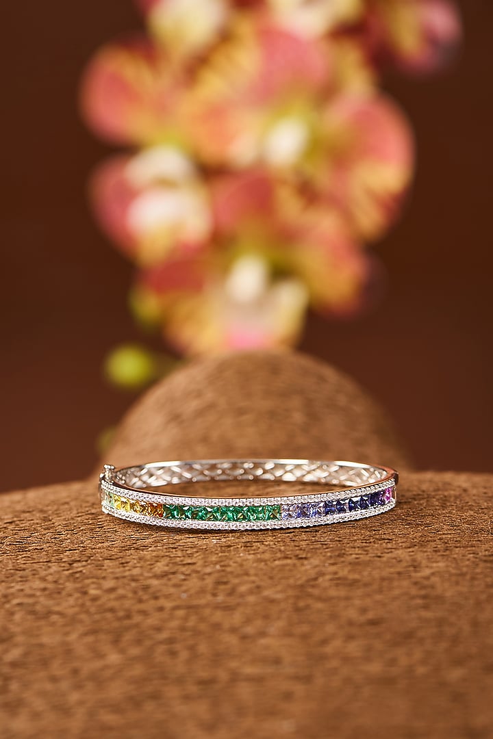 White Gold Finish Eurostar Zircon & Multi-Colored Sapphire Stone Bangle In Sterling Silver by STELLA CREATIONS at Pernia's Pop Up Shop