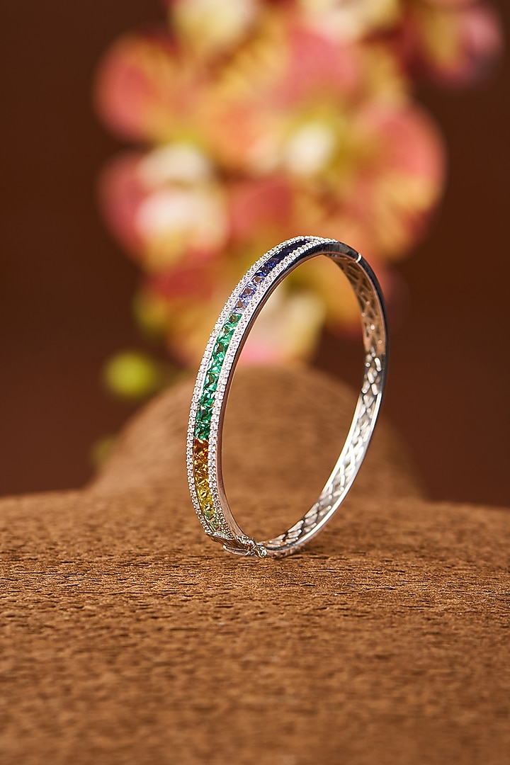 White Gold Finish Eurostar Zircon & Multi-Colored Sapphire Stone Bangle In Sterling Silver by STELLA CREATIONS at Pernia's Pop Up Shop