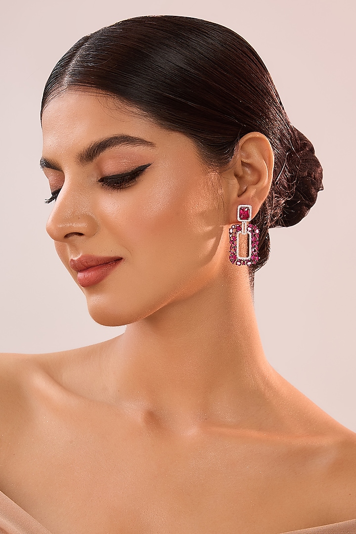 White Gold Finish Eurostar Zircon & Ruby Stone Dangler Earrings In Sterling Silver by STELLA CREATIONS at Pernia's Pop Up Shop