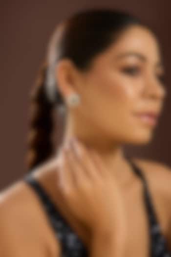 White Gold Finish Zircon & Emerald Stone Stud Earrings In Sterling Silver by STELLA CREATIONS at Pernia's Pop Up Shop