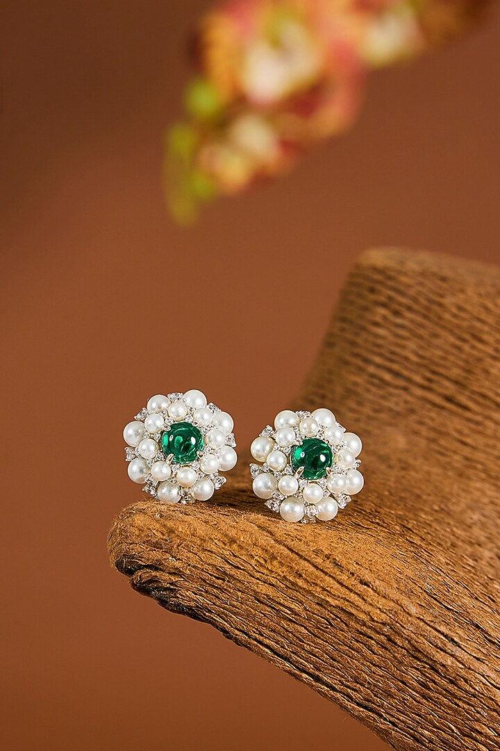 White Gold Finish Zircon & Emerald Stone Stud Earrings In Sterling Silver by STELLA CREATIONS at Pernia's Pop Up Shop