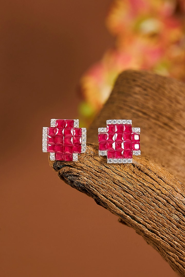 White Gold Finish Zircon & Ruby Stone Stud Earrings In Sterling Silver by STELLA CREATIONS at Pernia's Pop Up Shop