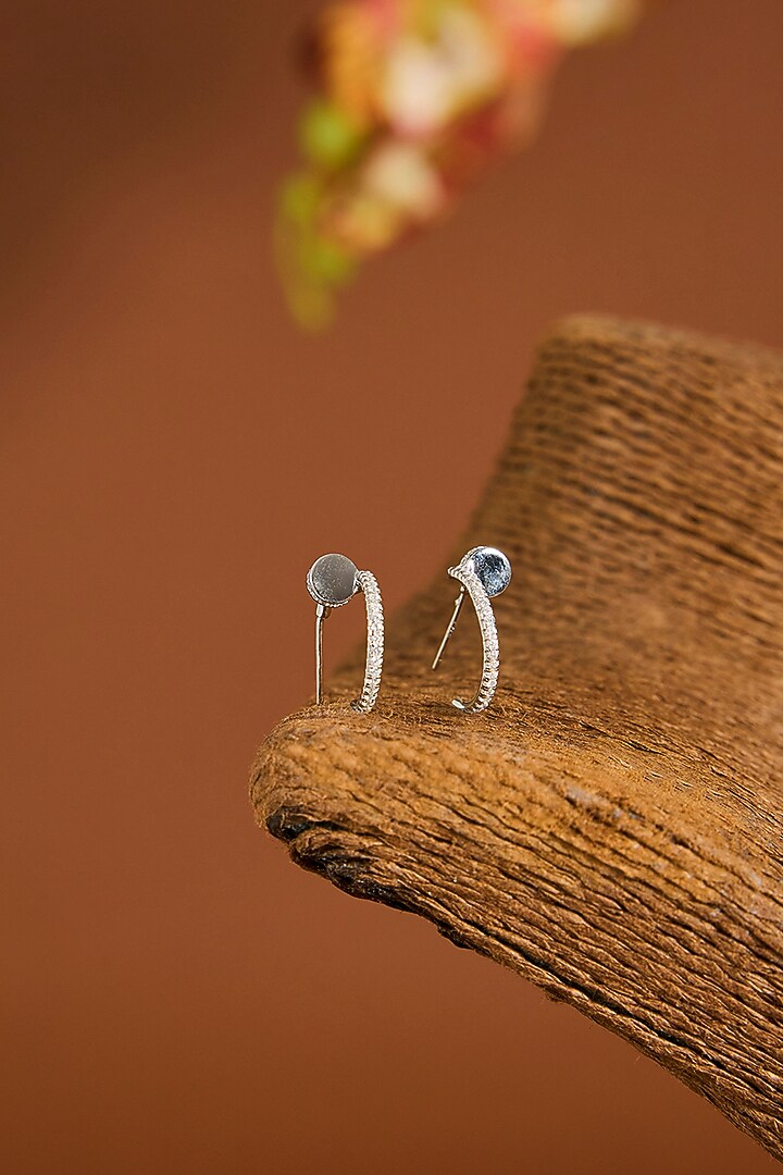White Gold Finish Zircon Hoop Earrings In Sterling Silver by STELLA CREATIONS at Pernia's Pop Up Shop