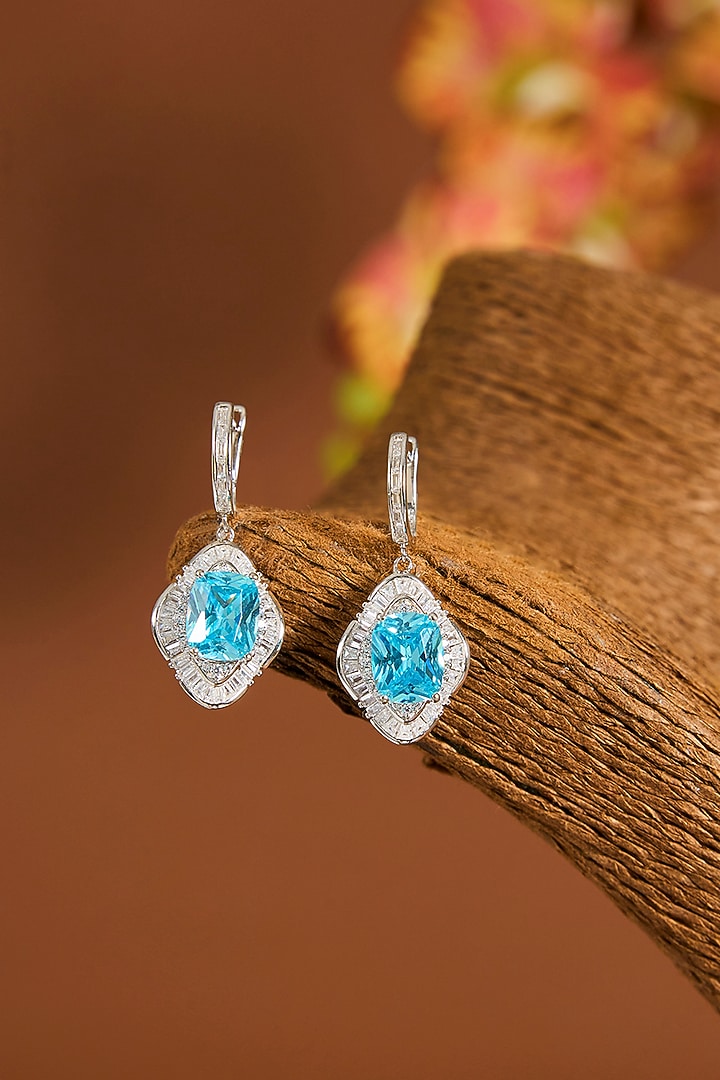White Gold Finish Zircon & Topaz Stone Dangler Earrings In Sterling Silver by STELLA CREATIONS at Pernia's Pop Up Shop