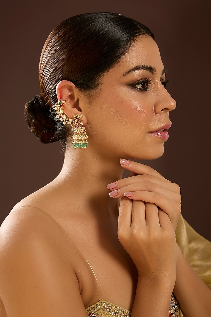 Yellow Gold Finish Moissanite Polki & Emerald Stone Jhumka Earrings In Sterling Silver by STELLA CREATIONS at Pernia's Pop Up Shop