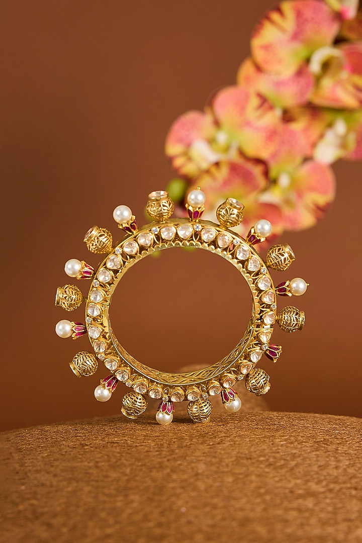Yellow Gold Finish Moissanite Polki & Swarovski Zircon Bangle In Sterling Silver by STELLA CREATIONS at Pernia's Pop Up Shop