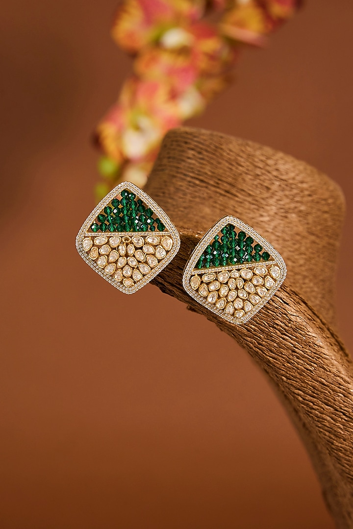 Yellow Gold Finish Moissanite Polki & Emerald Stone Stud Earrings In Sterling Silver by STELLA CREATIONS at Pernia's Pop Up Shop