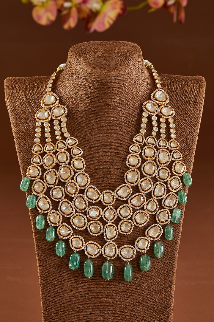 Gold Finish Moissanite Polki & Synthetic Emerald Stone Necklace Set In Sterling Silver by STELLA CREATIONS at Pernia's Pop Up Shop