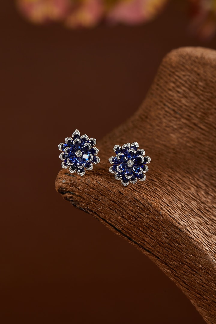 White Finish Zircon & Synthetic Blue Sapphire Stud Earrings In Sterling Silver by STELLA CREATIONS at Pernia's Pop Up Shop