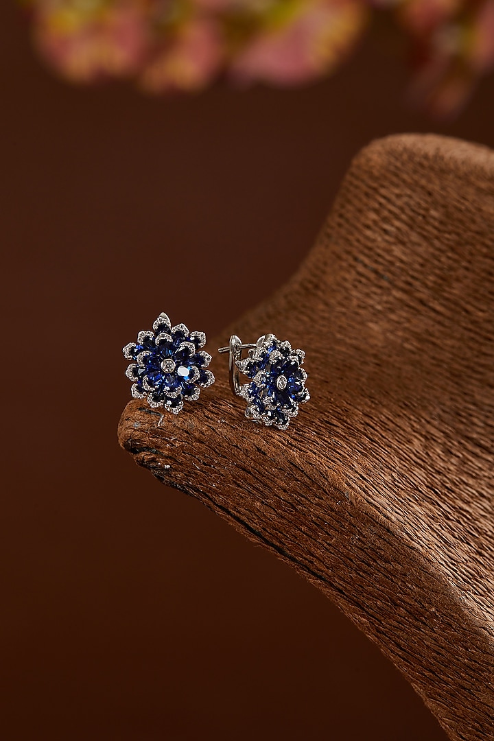 White Finish Zircon & Synthetic Blue Sapphire Stud Earrings In Sterling Silver by STELLA CREATIONS at Pernia's Pop Up Shop