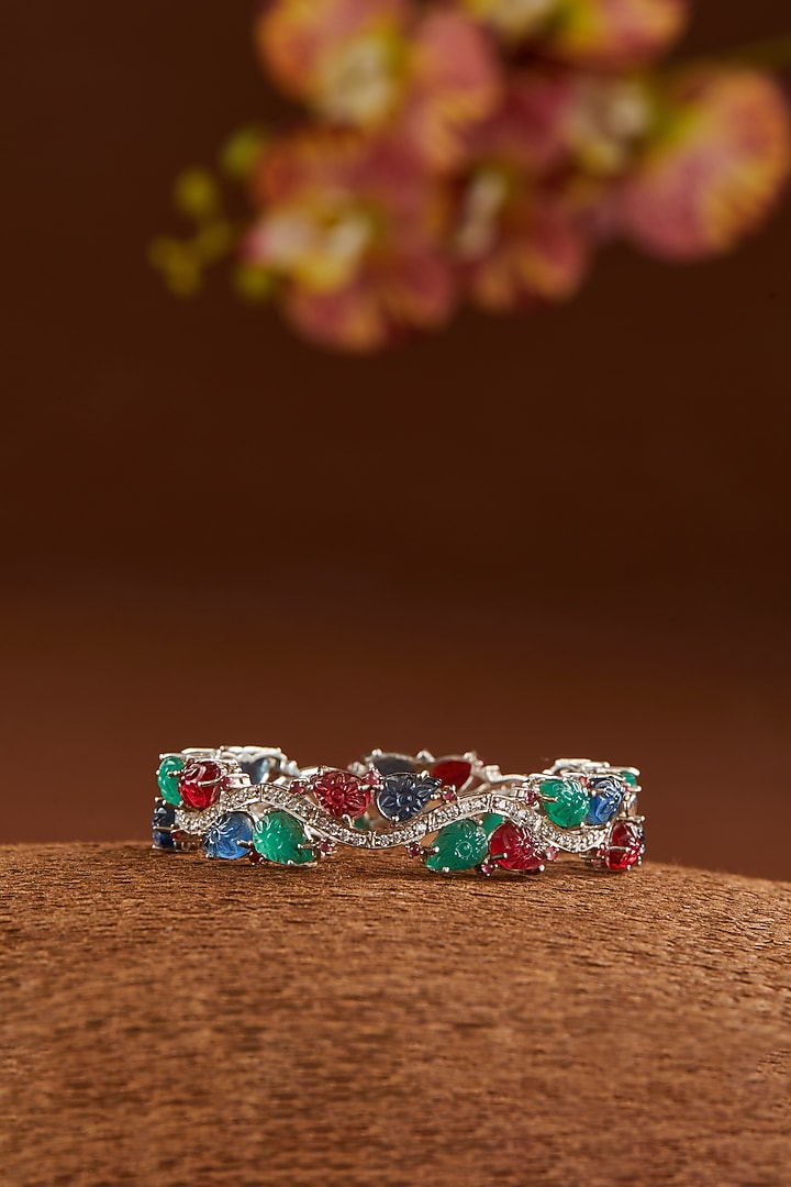 White Finish Ruby & Emerald Bangle In Sterling Silver by STELLA CREATIONS at Pernia's Pop Up Shop