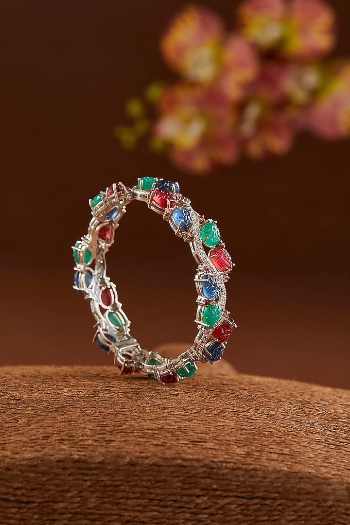 White Finish Ruby & Emerald Bangle In Sterling Silver by STELLA CREATIONS at Pernia's Pop Up Shop