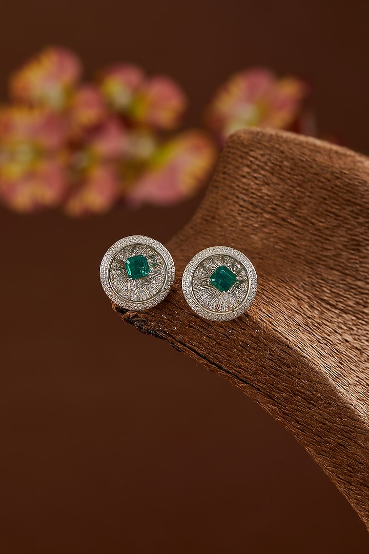 White Gold Finish Zircon & Synthetic Emerald Stone Stud Earrings In Sterling Silver by STELLA CREATIONS at Pernia's Pop Up Shop