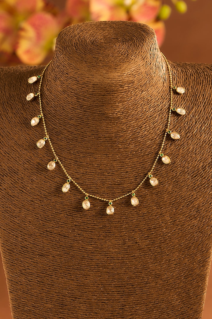 Yellow Gold Finish Moissanite Polki & Glass-Filled Emerald Stone Necklace In Sterling Silver by STELLA CREATIONS at Pernia's Pop Up Shop
