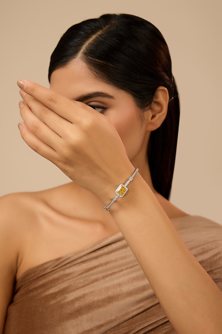 White Finish Eurostar Zircon & Yellow Sapphire Stone Openable Bracelet In Sterling Silver by STELLA CREATIONS at Pernia's Pop Up Shop