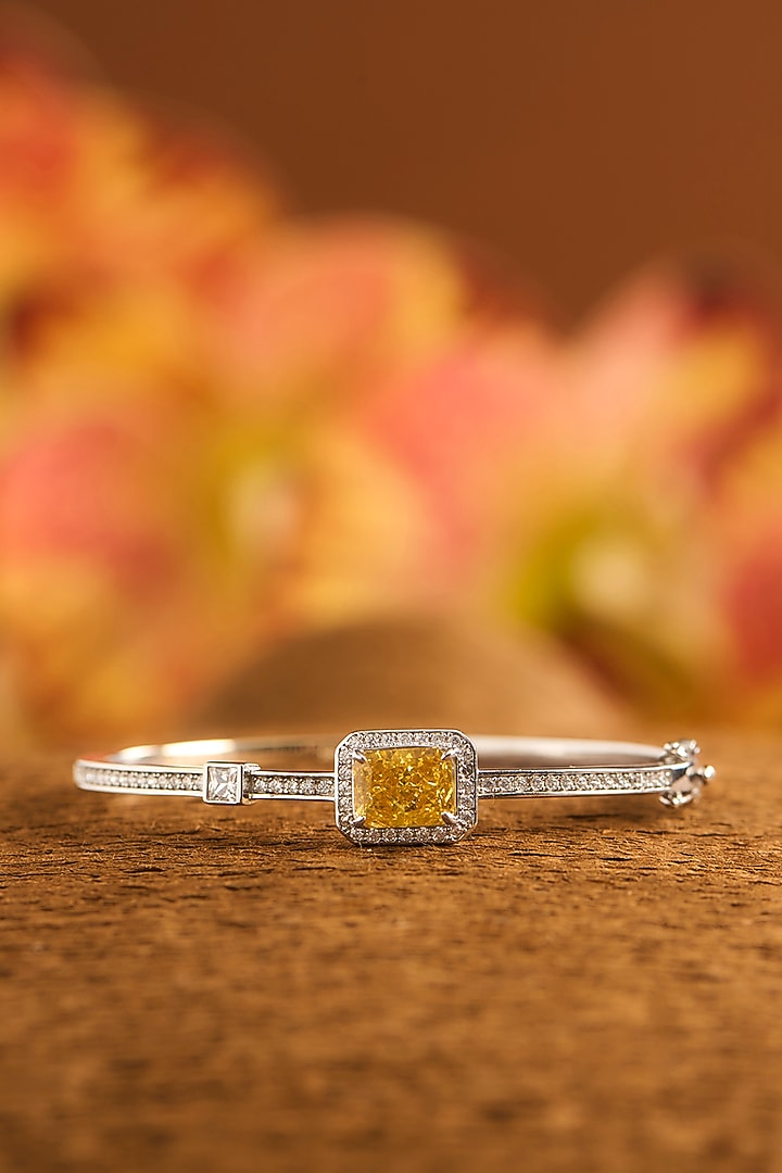 White Finish Eurostar Zircon & Yellow Sapphire Stone Openable Bracelet In Sterling Silver by STELLA CREATIONS at Pernia's Pop Up Shop